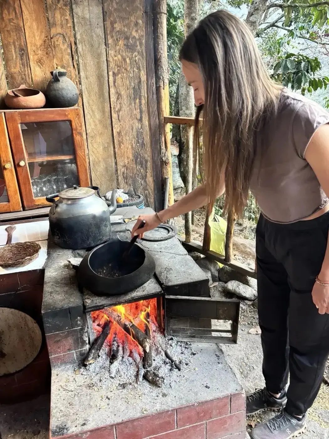 Stirring coffee on the farm stove